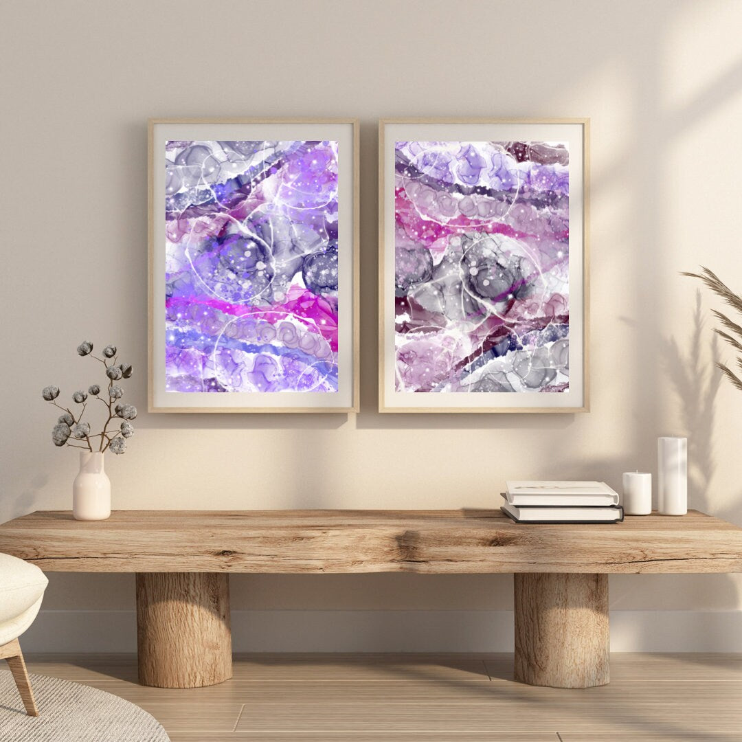 Abstract graffiti art prints, spiritual wall art, pink and purple, set of 2 displayed in mounted frames.