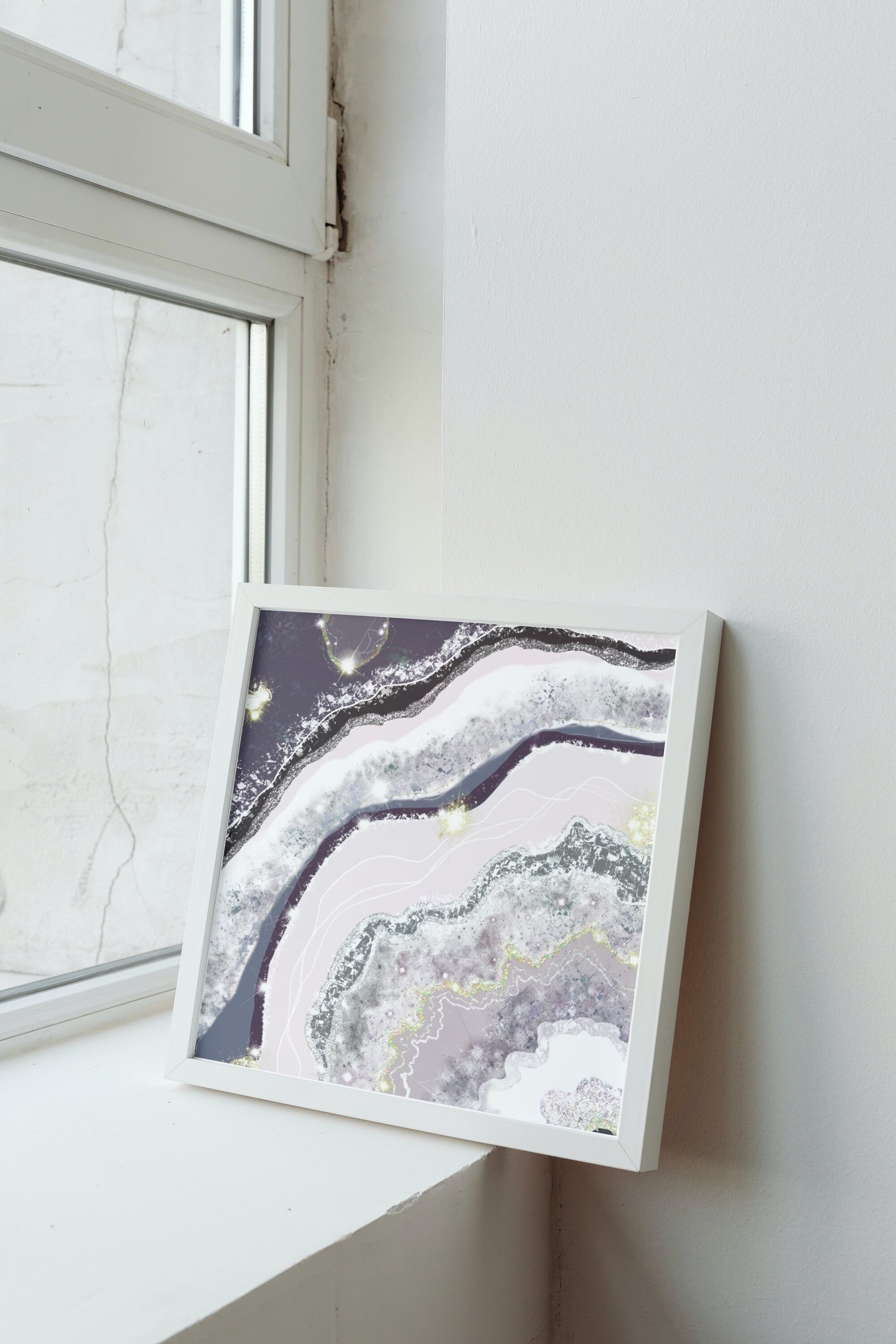 Geode agate wall art, spiritual art print, pink purple, displayed in mounted frame.