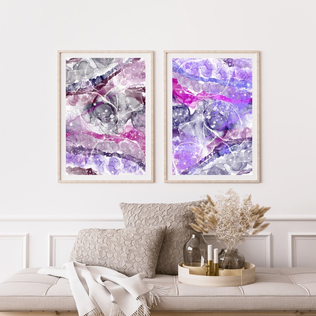 Abstract graffiti art prints, spiritual wall art, pink and purple, set of 2 displayed in mounted frames.