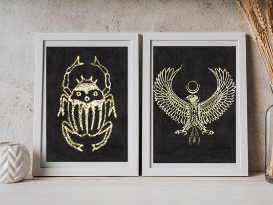 Spiritual wall art, ancient Egyptian art prints, black and gold, set of two art prints displayed in mounted frames.