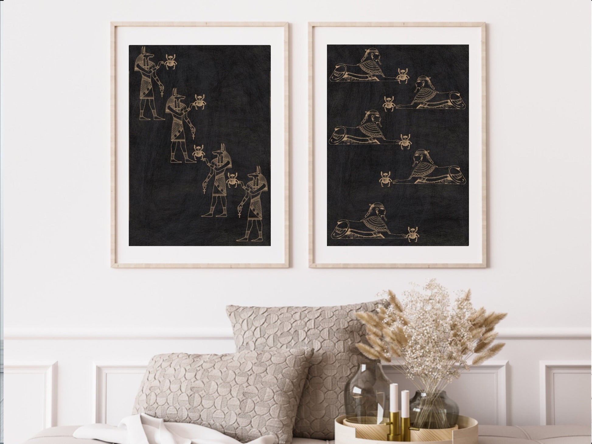 Spiritual wall art, ancient Egyptian art prints, black and gold, set of two art prints displayed in mounted frames.